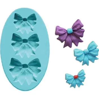 Přisada na vaření a pečení Silikonová formička mašličky 9x5,5cm - Cakesicq | Cukrářské potřeby