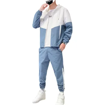 Pánská bunda Pánská souprava tepláky na tkaničku, bunda s kapucí na zip a kapsami, polyester modrá S