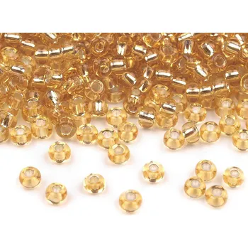 Korálek Rokajl Preciosa 8/0 - 3 mm s průtahem Balení: 20 g, Varianta: 17020 zlatá sv. - 8596475087353