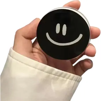 Magnetický držák pro iPhone 12 až 16 Stylový držák na telefon s motivem asymetrického smajlíku Dekorativní stojánek černá