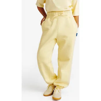 DECATHLON Dámské tepláky Elementals L ŽLUTÁ