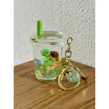 Klíčenka v tekutině s želvičkou v srdci