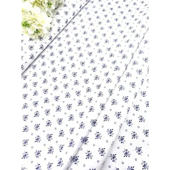 Folklórní modré kytičky na bílé