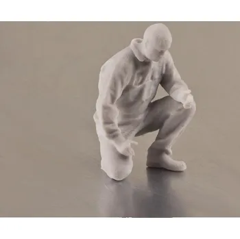 RC model Krick Modelltechnik Krick Figurka strojník klečící 1:32 nenabarvená - expresní doprava