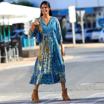 Dámské šaty Kreponové midi šaty s 3/4 rukávy a potiskem modrá/bledě modrá 54