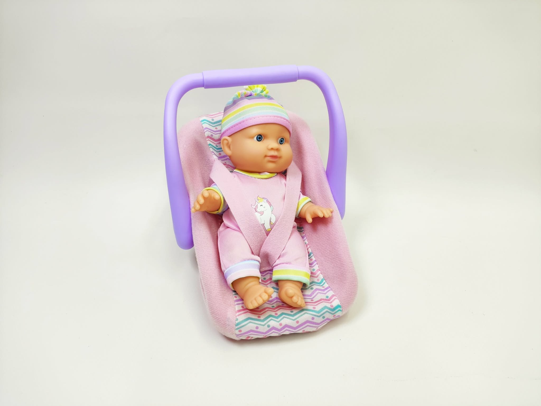 Teddies Panenka miminko 20 cm plast v nosítku/autosedačce