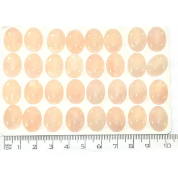Přírodní kámen Mugle růženín ovál 16x12mm