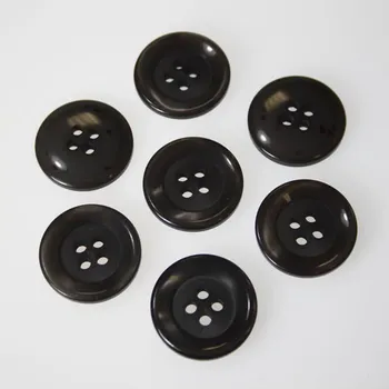 Knoflík Knoflík šedohnědý K32-1, průměr 20 mm.