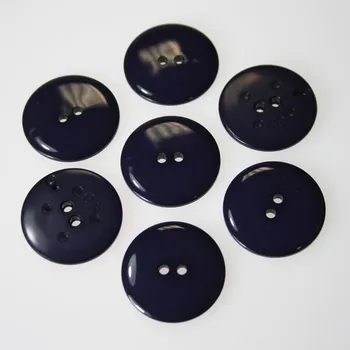 Knoflík Knoflík tmavě fialový K40-4, průměr 25 mm.