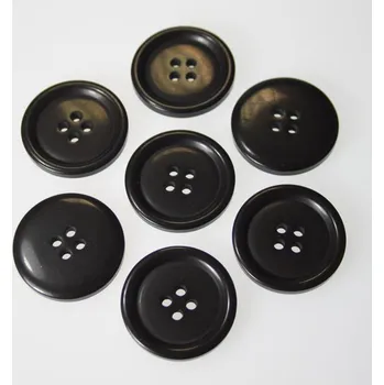 Knoflík Knoflík černohnědý K44-3, průměr 28 mm.