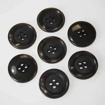 Knoflík Knoflík šedohnědý K36-16, průměr 23 mm.