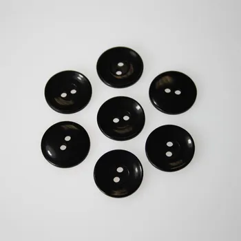 Knoflík Knoflík černý K28-9, průměr 18 mm.