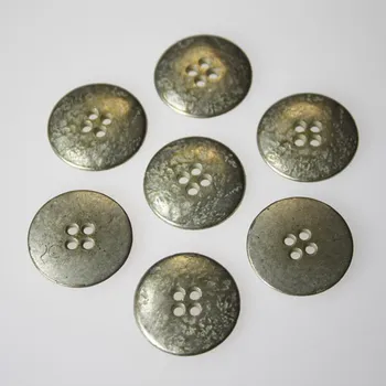 Knoflík Knoflík stříbrný K36-15, průměr 23 mm.