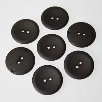 Knoflík Knoflík tmavě hnědý K44-5, průměr 28 mm.